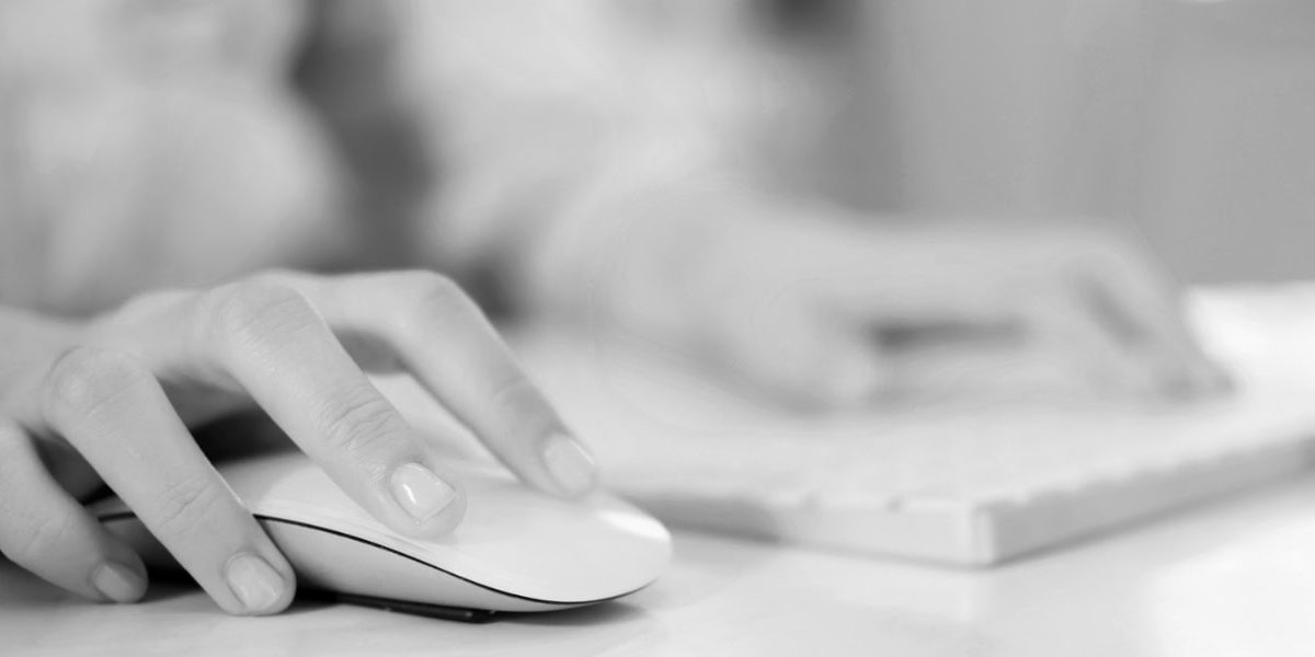 Hand On Computer Mouse